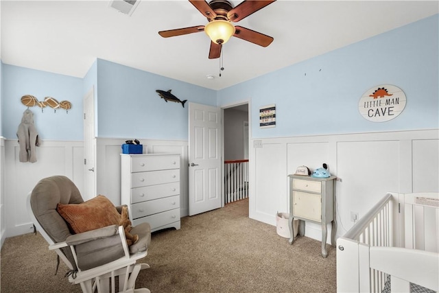 6412 Interlaken Dr, South Fayette, PA 15057 - bedroom with light colored carpet, a wainscoted wall, a decorative wall, and ceiling fan