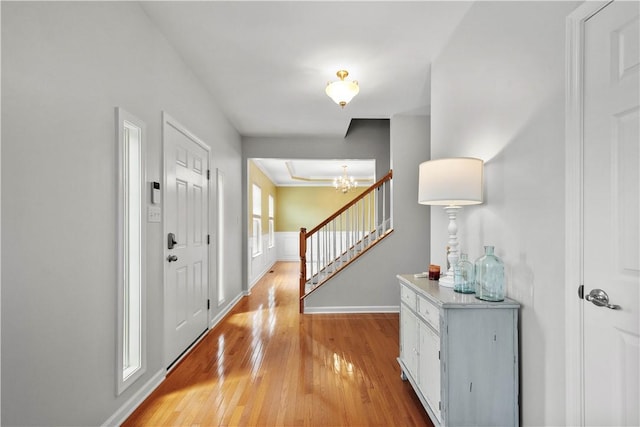 6412 Interlaken Dr, South Fayette, PA 15057 - foyer featuring light wood-style floors, stairs, and a chandelier