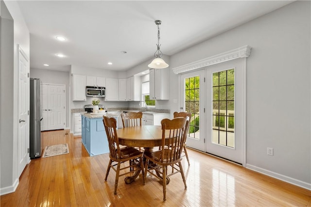 6412 Interlaken Dr, South Fayette, PA 15057 - dining room with light wood finished floors and recessed lighting