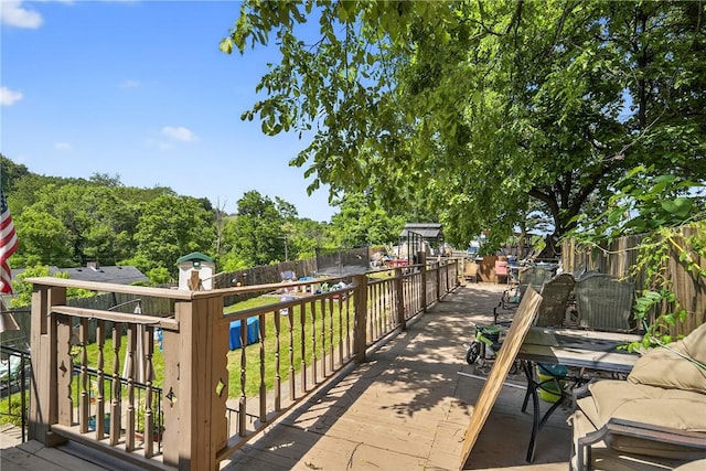 3879 Pittsburgh Rd, Perry Twp Fay, PA 15473 - fenced backyard with a deck and a trampoline