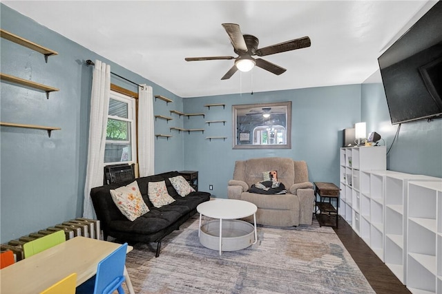 3879 Pittsburgh Rd, Perry Twp Fay, PA 15473 - living room with a ceiling fan, radiator, and wood finished floors