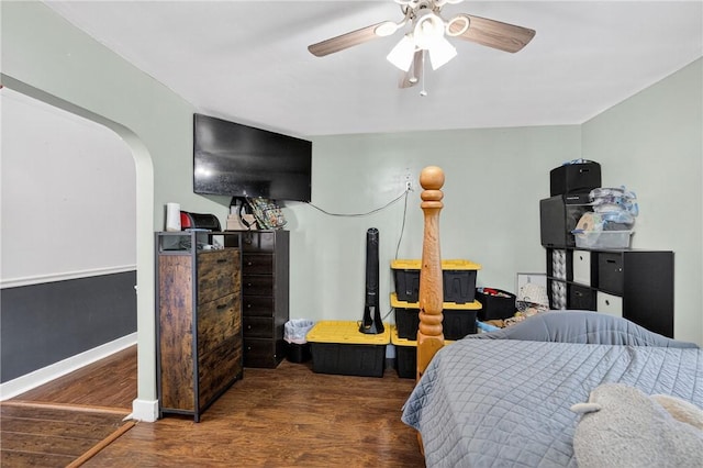 3879 Pittsburgh Rd, Perry Twp Fay, PA 15473 - bedroom with wood finished floors, arched walkways, and ceiling fan