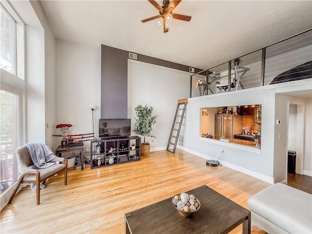 66 Pius St Unit 103, South Side, PA 15203 - living room with ceiling fan and wood finished floors
