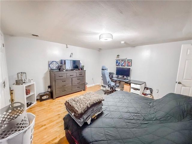 66 Pius St Unit 103, South Side, PA 15203 - bedroom with wood finished floors and an office area