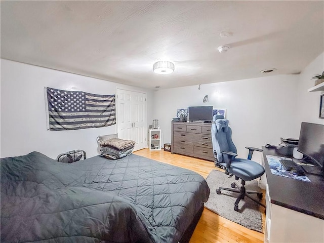 66 Pius St Unit 103, South Side, PA 15203 - bedroom with light wood-style floors and a desk