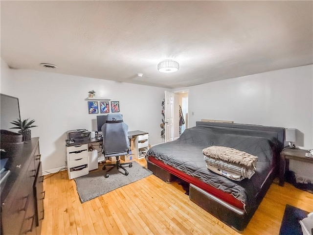 66 Pius St Unit 103, South Side, PA 15203 - bedroom featuring wood-type flooring and a desk