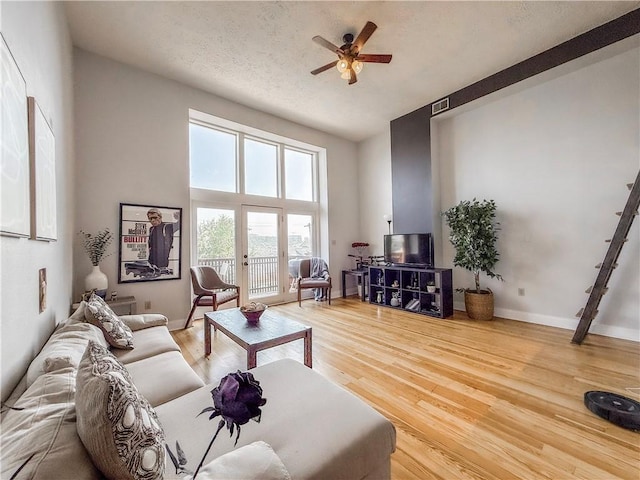 66 Pius St Unit 103, South Side, PA 15203 - living room with a ceiling fan and wood finished floors
