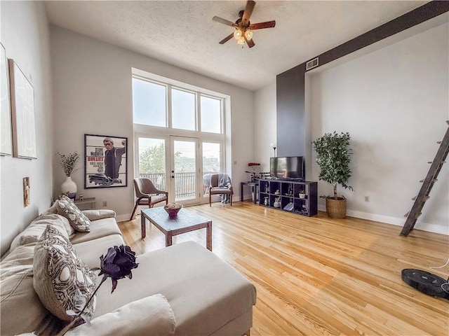 66 Pius St Unit 103, South Side, PA 15203 - living area with ceiling fan and light wood-style flooring