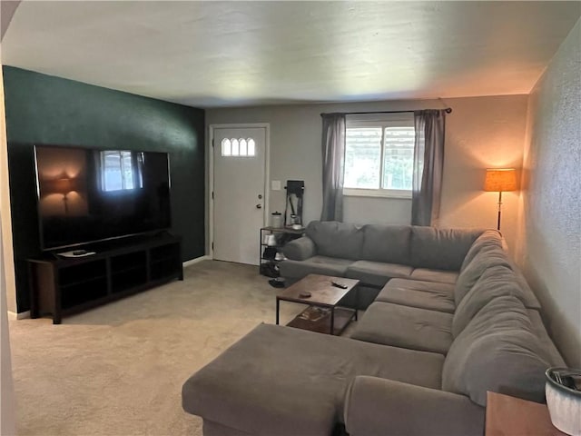 2103 Vermont Ave, West Mifflin, PA 15122 - living area featuring a textured wall and light colored carpet
