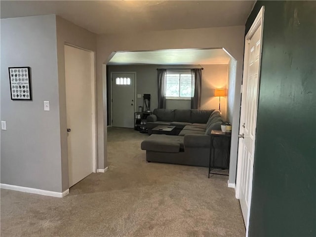 2103 Vermont Ave, West Mifflin, PA 15122 - carpeted living room with arched walkways and baseboards