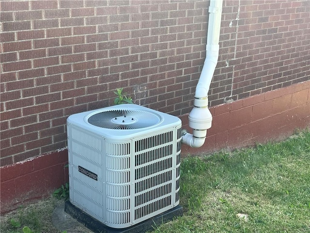 2103 Vermont Ave, West Mifflin, PA 15122 - exterior view of a central air condition unit and brick siding