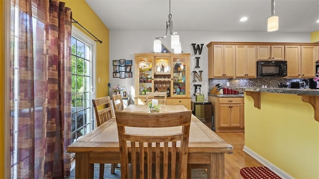 1025 Brookfield Dr, Bethel Park, PA 15102 - dining room with light wood-type flooring, recessed lighting, and wine cooler