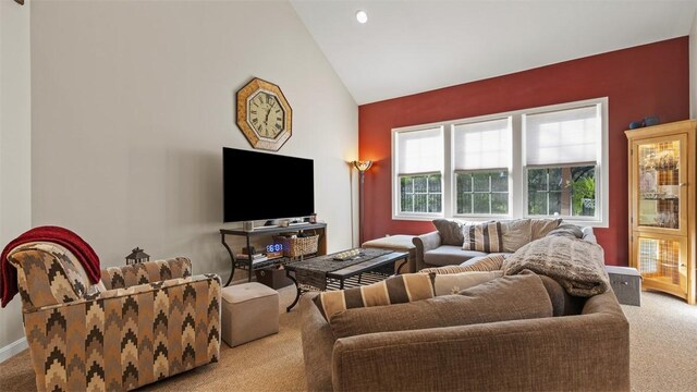 1025 Brookfield Dr, Bethel Park, PA 15102 - carpeted living area with baseboards and high vaulted ceiling