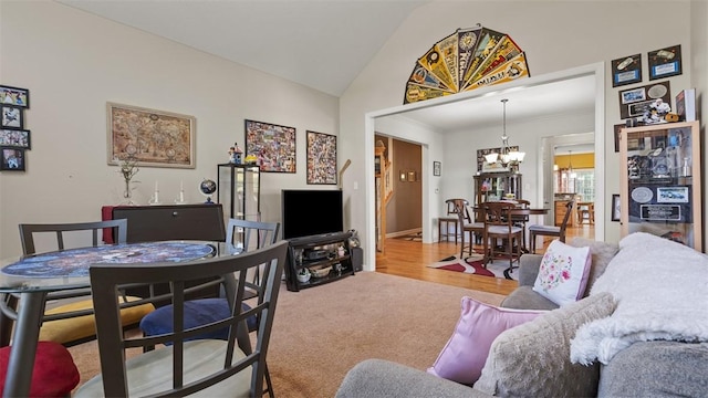 1025 Brookfield Dr, Bethel Park, PA 15102 - carpeted living room featuring a chandelier and lofted ceiling
