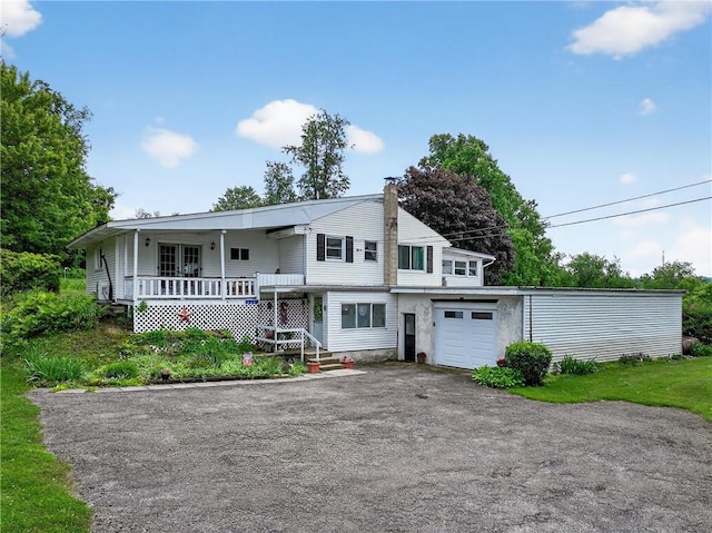 468 Crest Dr, Delmont, PA 15626 - view of front of property featuring a chimney and driveway