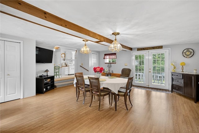 468 Crest Dr, Delmont, PA 15626 - dining area with light wood-type flooring, a chandelier, and french doors