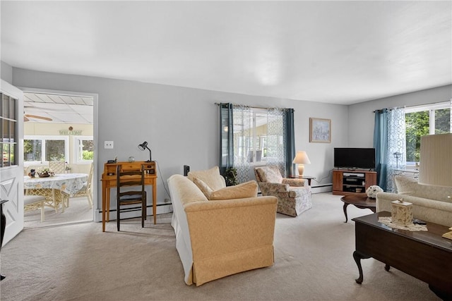 468 Crest Dr, Delmont, PA 15626 - living area with a baseboard heating unit and light carpet