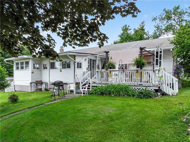 468 Crest Dr, Delmont, PA 15626 - view of front facade with a front yard, a wooden deck, and a chimney