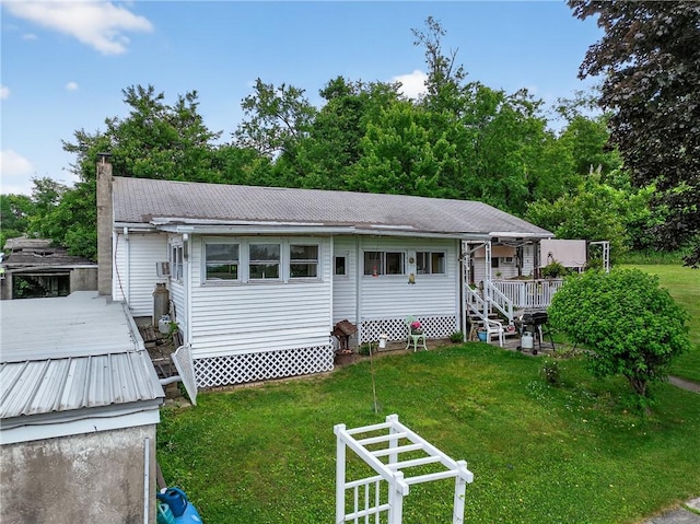 468 Crest Dr, Delmont, PA 15626 - view of front of property with a chimney, a front lawn, and a deck