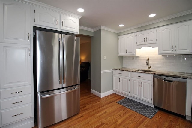 1351 Sky Ridge Dr, Upper St Clair, PA 15241 - kitchen featuring stainless steel appliances, light wood-type flooring, stone counters, crown molding, and white cabinets