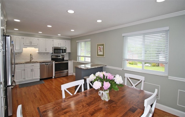 1351 Sky Ridge Dr, Upper St Clair, PA 15241 - dining room featuring dark wood-type flooring, crown molding, and recessed lighting