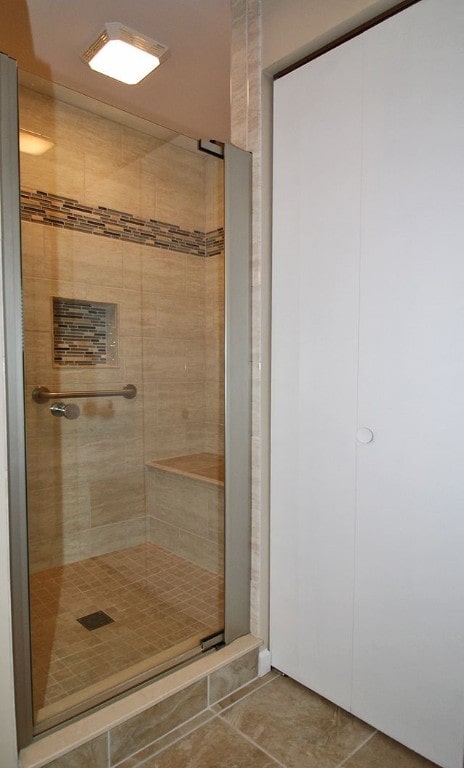 1351 Sky Ridge Dr, Upper St Clair, PA 15241 - bathroom featuring a stall shower and tile patterned flooring