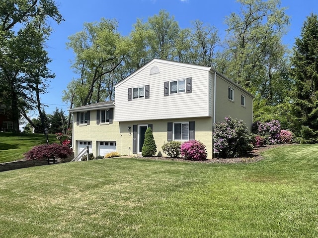 1351 Sky Ridge Dr, Upper St Clair, PA 15241 - tri-level home with an attached garage and a front yard