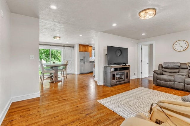 1659 Hooker Rd, Pa, PA 16041 - living area featuring light wood-style flooring and recessed lighting