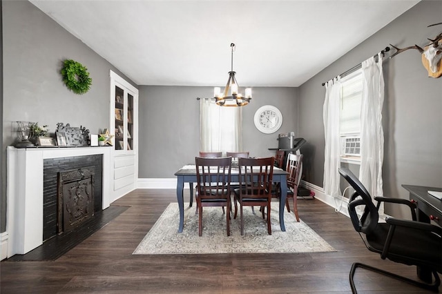 503 E Murphy Ave, Connellsville, PA 15425 - dining room featuring a chandelier, dark wood finished floors, and a fireplace with flush hearth