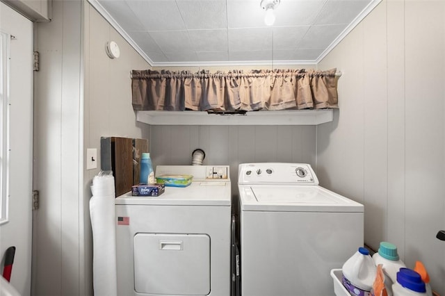 503 E Murphy Ave, Connellsville, PA 15425 - laundry area with washing machine and clothes dryer, crown molding, and a decorative wall