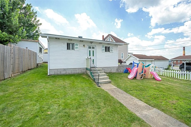 503 E Murphy Ave, Connellsville, PA 15425 - back of property featuring a playground and a fenced backyard