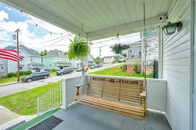 503 E Murphy Ave, Connellsville, PA 15425 - porch featuring a residential view and a lawn