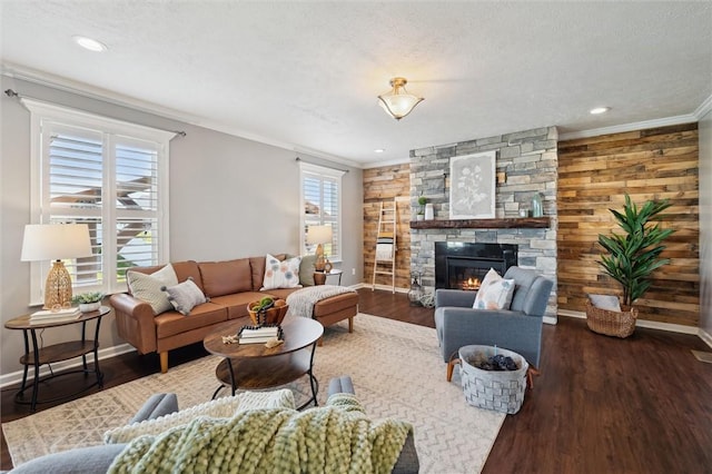 108 Norfolk Dr, Buffalo Twp But, PA 16055 - living area featuring a stone fireplace, ornamental molding, wood finished floors, recessed lighting, and a textured ceiling