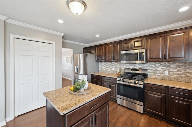 108 Norfolk Dr, Buffalo Twp But, PA 16055 - kitchen featuring stainless steel appliances, dark wood-style floors, dark brown cabinets, decorative backsplash, and ornamental molding