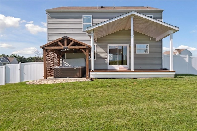 108 Norfolk Dr, Buffalo Twp But, PA 16055 - rear view of house with a hot tub and a deck