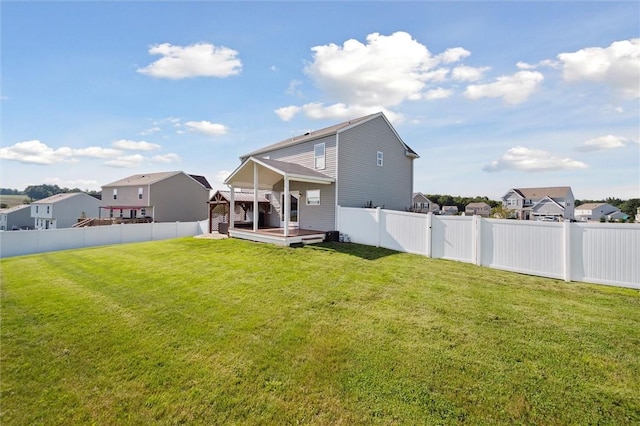 108 Norfolk Dr, Buffalo Twp But, PA 16055 - rear view of property featuring a fenced backyard, a deck, and a residential view