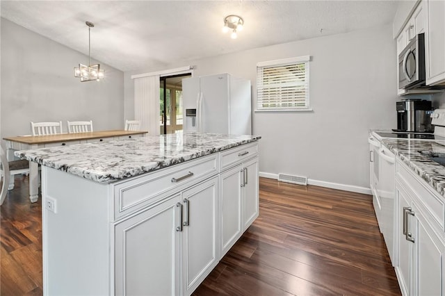 833 Glendale Ct, Cranberry Twp, PA 16066 - kitchen featuring white appliances, a center island, a chandelier, dark wood-style flooring, and white cabinetry