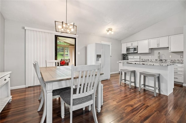 833 Glendale Ct, Cranberry Twp, PA 16066 - dining space featuring vaulted ceiling, a chandelier, and dark wood-style flooring