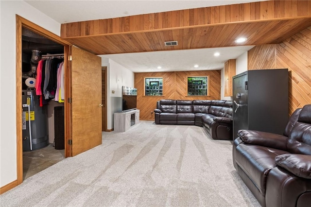 833 Glendale Ct, Cranberry Twp, PA 16066 - living room featuring wood walls, gas water heater, carpet flooring, and recessed lighting