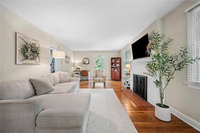727 Vermont Ave, Mt Lebanon, PA 15234 - living area featuring a fireplace and wood finished floors