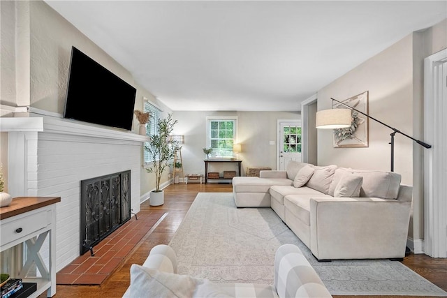 727 Vermont Ave, Mt Lebanon, PA 15234 - living room featuring a brick fireplace and wood finished floors