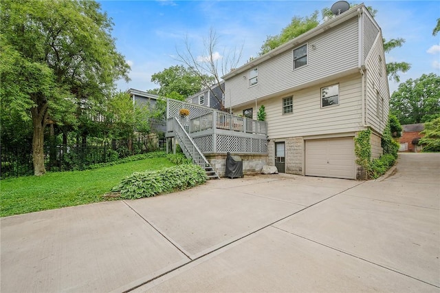727 Vermont Ave, Mt Lebanon, PA 15234 - back of house with concrete driveway, stairs, a deck, a garage, and a lawn