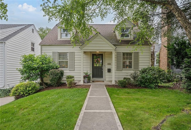 727 Vermont Ave, Mt Lebanon, PA 15234 - new england style home with a front lawn and roof with shingles