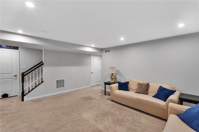 1006 Callaway Dr, Jeannette, PA 15644 - living area featuring recessed lighting, stairway, and carpet flooring