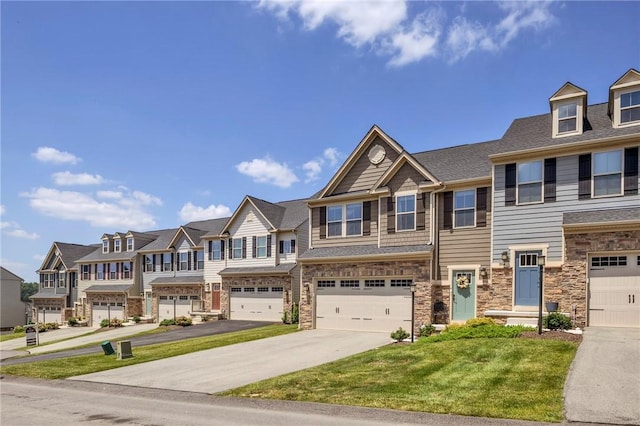 1006 Callaway Dr, Jeannette, PA 15644 - view of property featuring a residential view, driveway, a garage, a front yard, and stone siding