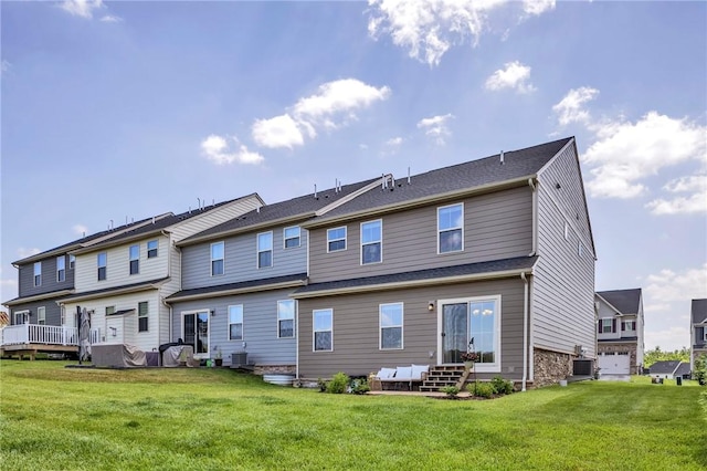 1006 Callaway Dr, Jeannette, PA 15644 - back of property featuring a lawn