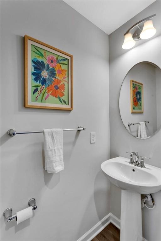 1006 Callaway Dr, Jeannette, PA 15644 - bathroom with a sink and wood finished floors