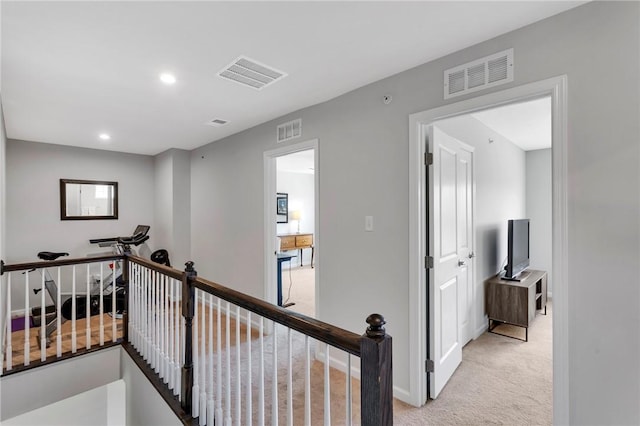 1006 Callaway Dr, Jeannette, PA 15644 - corridor featuring an upstairs landing, light colored carpet, and recessed lighting