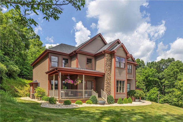 245 Shaw Ct, Salem Twp Wml, PA 15670 - view of front facade featuring covered porch, a front lawn, and a shingled roof
