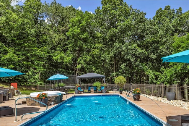 245 Shaw Ct, Salem Twp Wml, PA 15670 - view of swimming pool with a gazebo, a fenced backyard, and a patio area